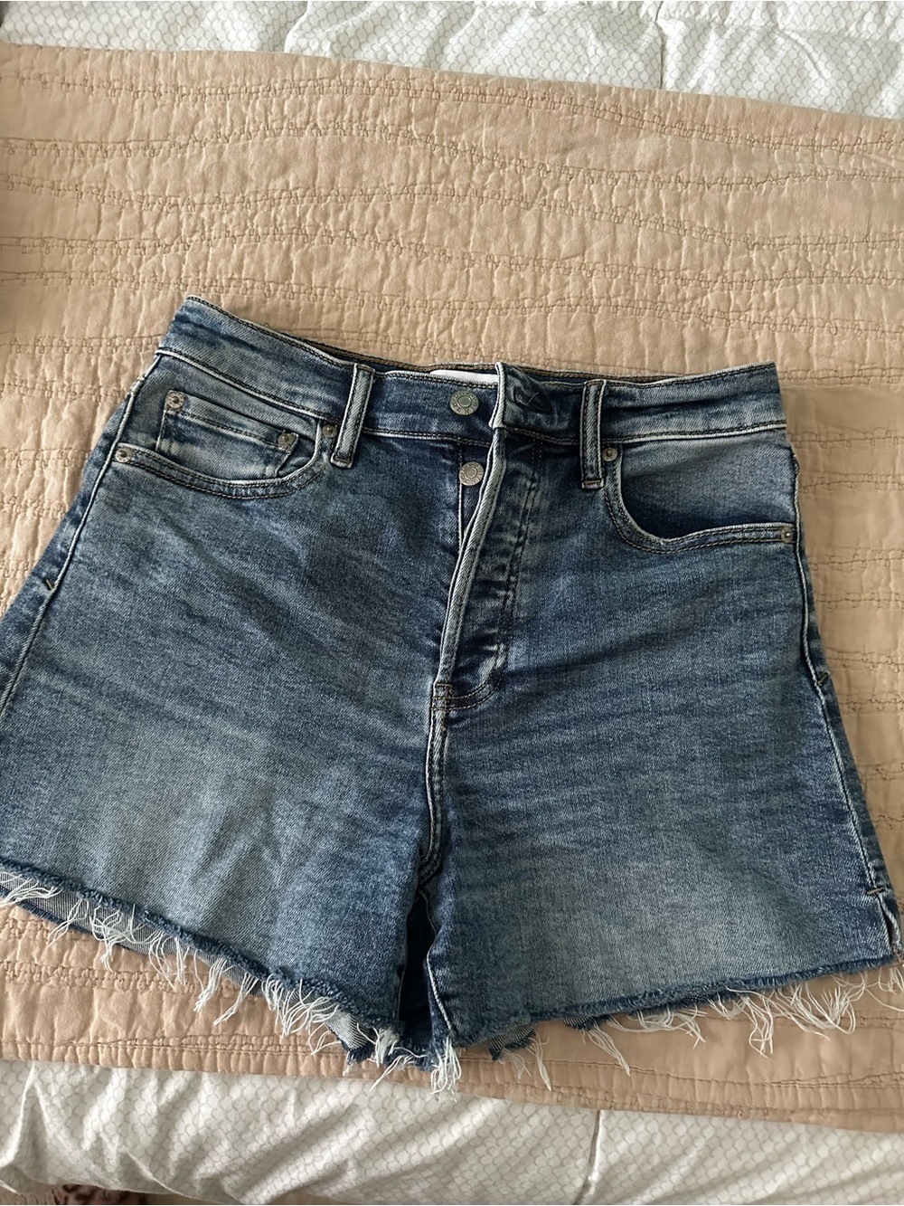 Women's High-Rise Blue Denim Jean Shorts with Frayed Hem